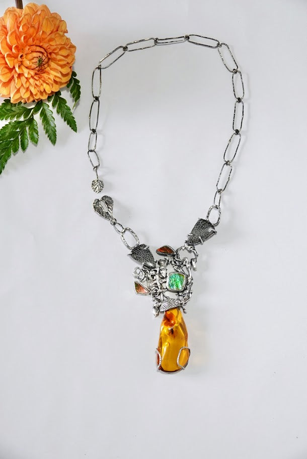 Amber insect inclusion, Jurassic Necklace black coral fossils, ammolite necklace