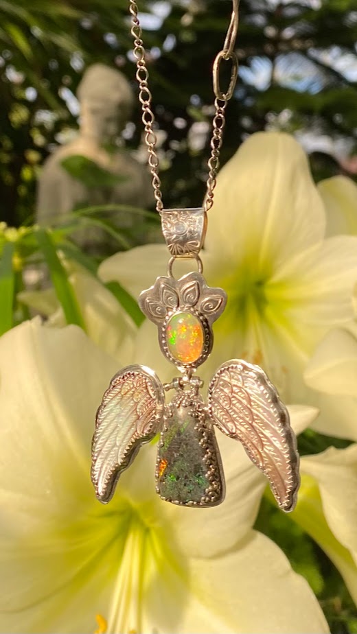 Angel necklace with opal, Andamooka Matrix Opal and hand carved Mother Pearl Wings