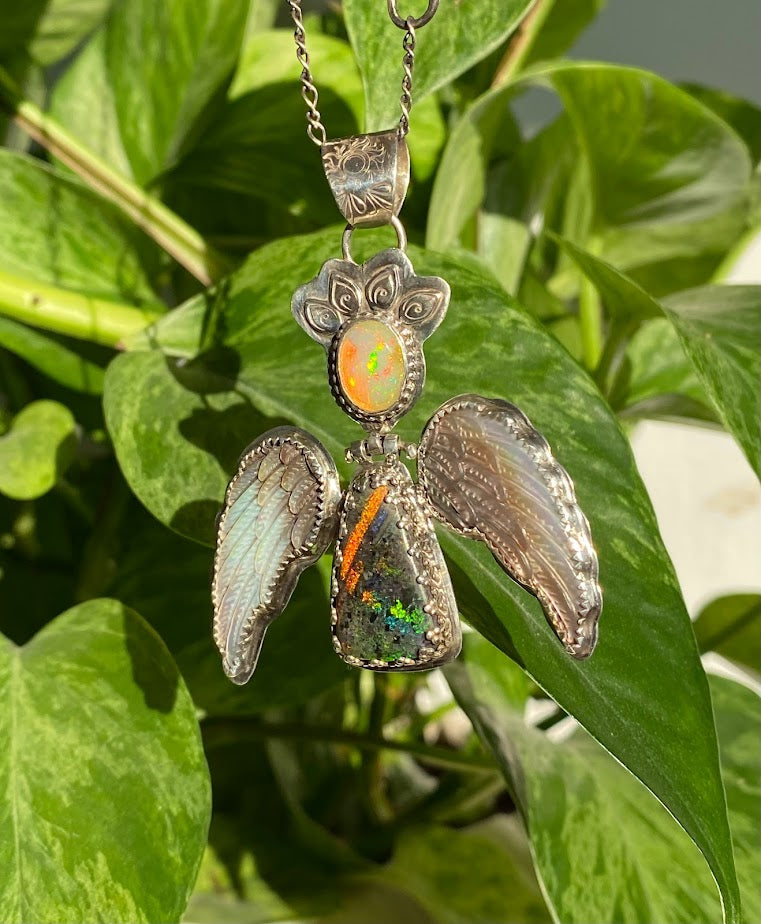 Angel necklace with opal, Andamooka Matrix Opal and hand carved Mother Pearl Wings