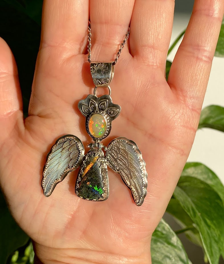 Angel necklace with opal, Andamooka Matrix Opal and hand carved Mother Pearl Wings